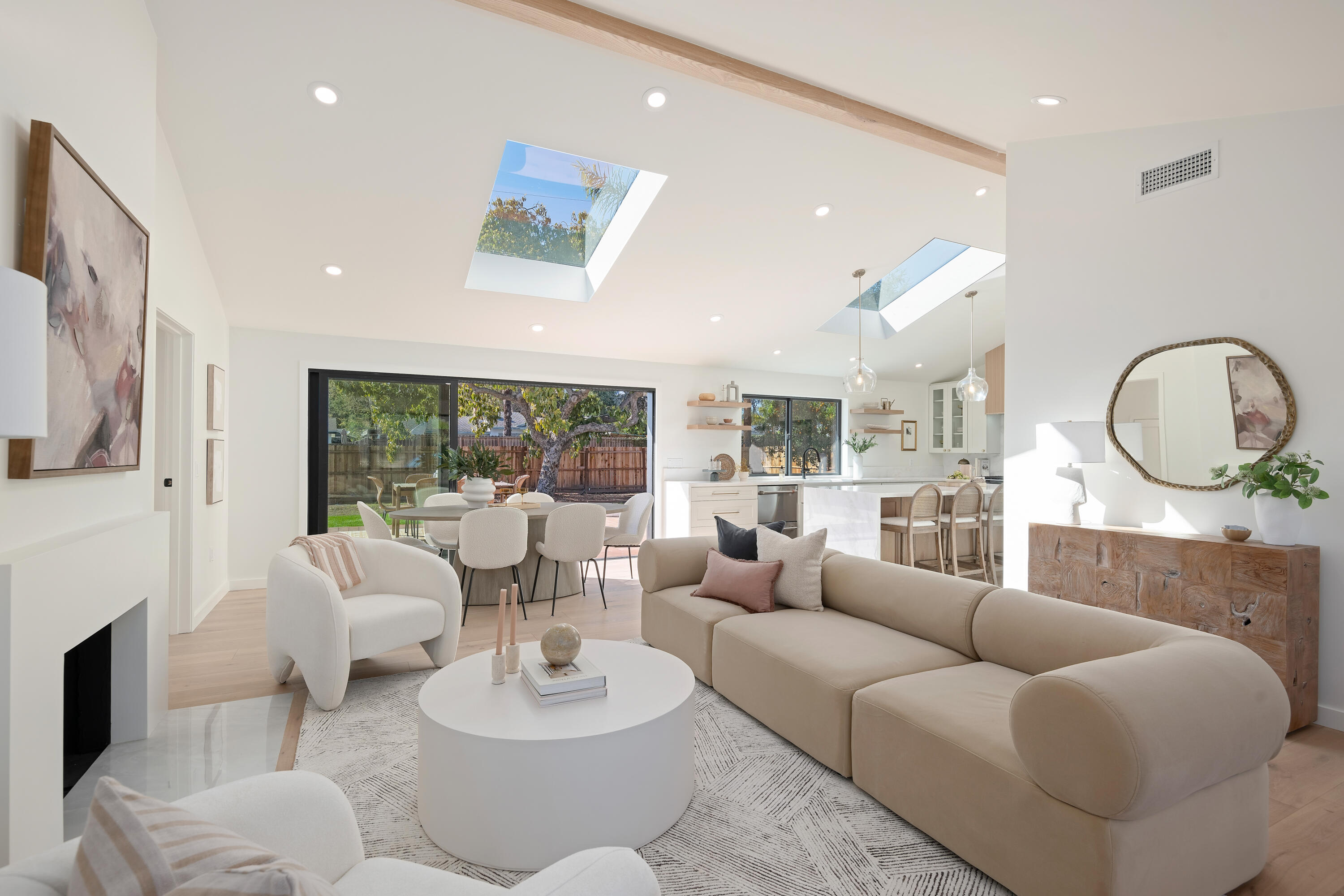 501 Northview Road Santa Barbara, CA 93105 - Photo 5 of 31 a living room with furniture a fireplace and a large window