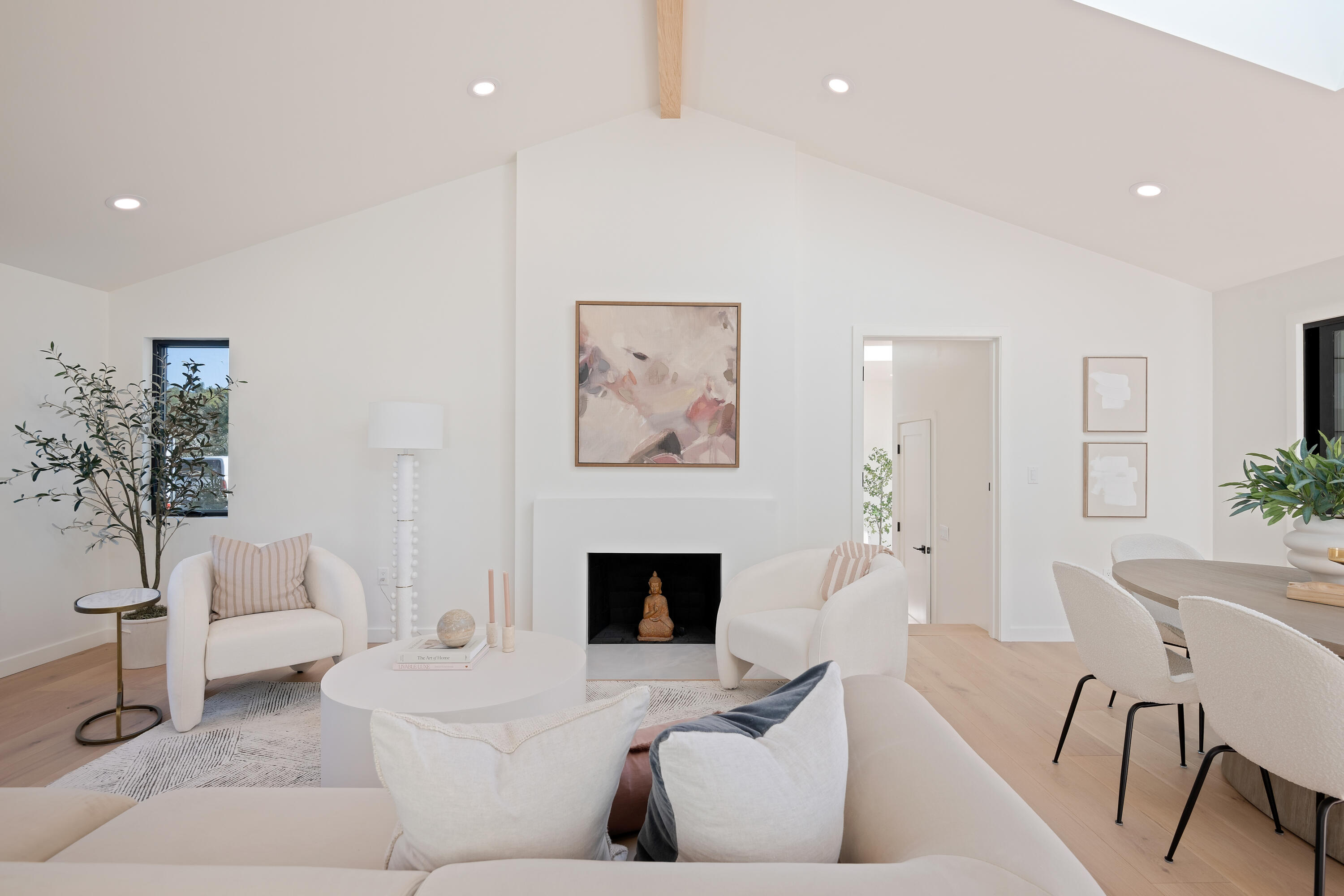 501 Northview Road Santa Barbara, CA 93105 - Photo 8 of 31 a living room with furniture a large window and a fireplace