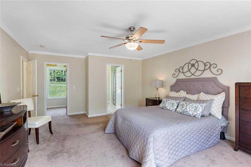 1117 Tangle Lane High Point, NC 27265 - Photo 16 of 29 Spacious master has crown molding, WIC and lots of natural light.