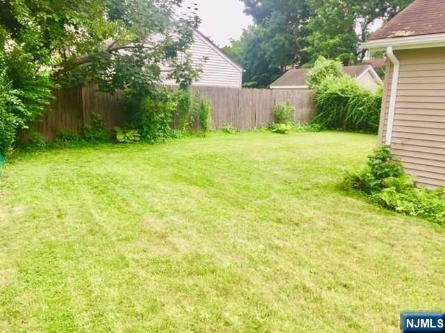 1249 Beaumont Avenue Teaneck, NJ 07666 - Photo 23 of 23 a view of a back yard of the house