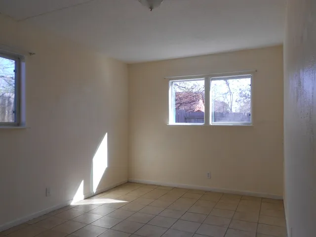 a bathroom with a sink vanity and a mirror