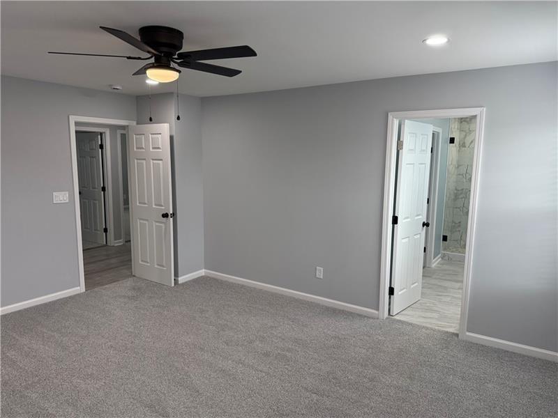 1202 Pisgah Road Southwest Austell, GA 30168 - Photo 4 of 30 wooden floor in an empty room
