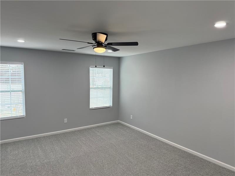 1202 Pisgah Road Southwest Austell, GA 30168 - Photo 9 of 30 an empty room with windows