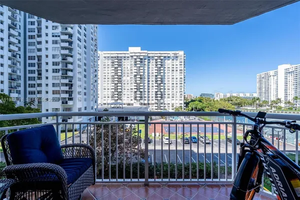 a view of a swimming pool and a chairs
