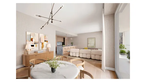 a living room with furniture and a table