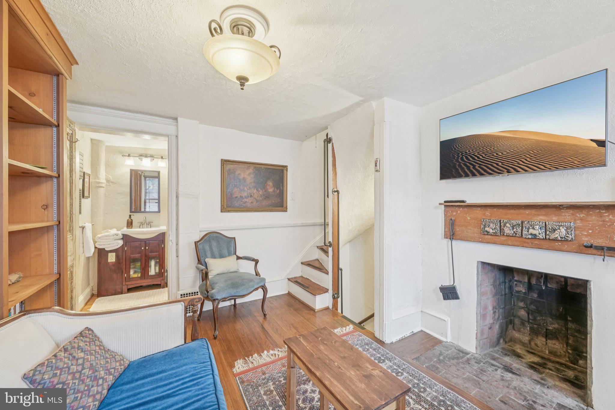 405 South 17th Street Philadelphia, PA 19146 - Photo 11 of 24 a living room with furniture and a fireplace