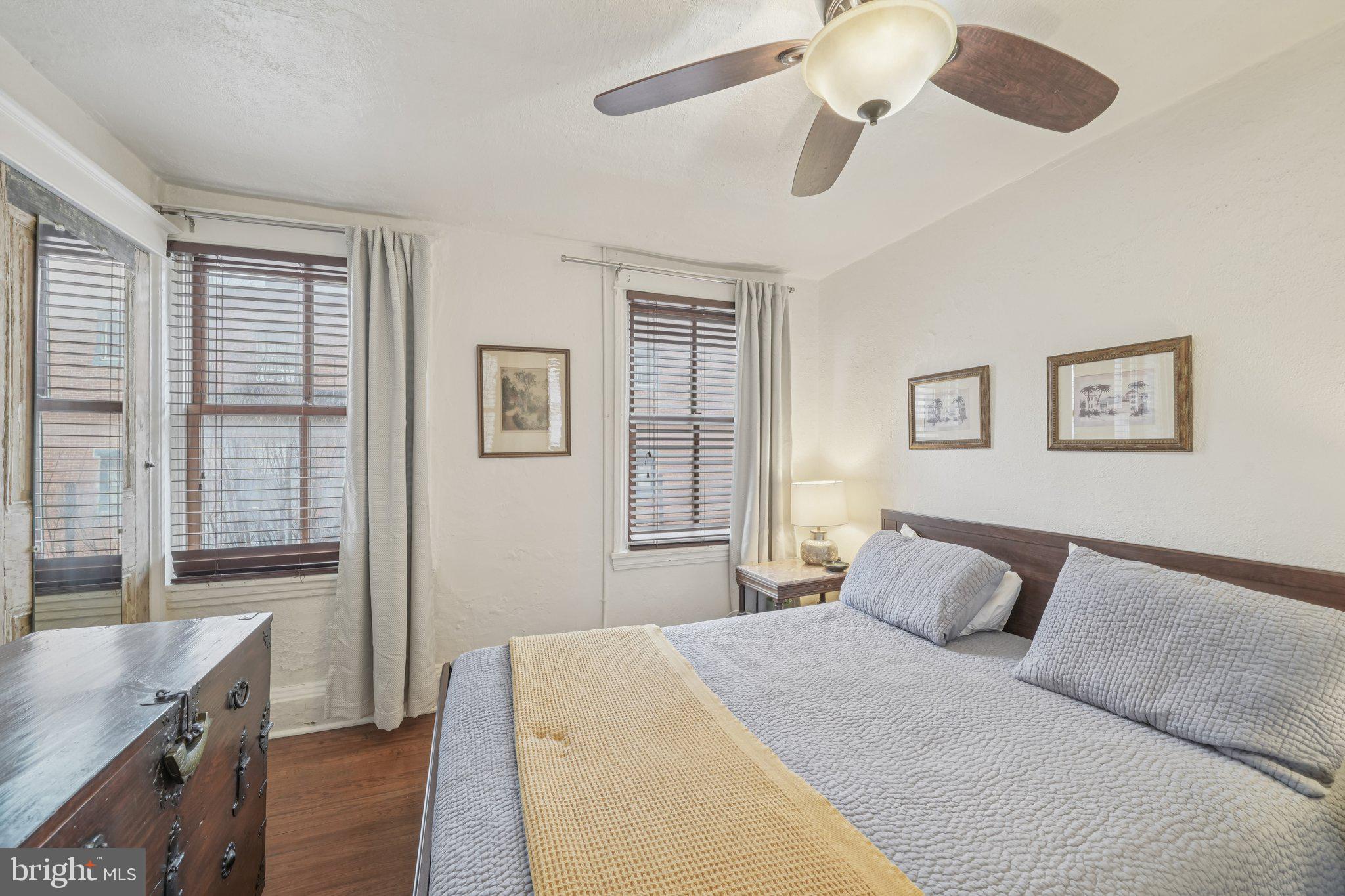 405 South 17th Street Philadelphia, PA 19146 - Photo 17 of 24 a bedroom with a large bed and a window