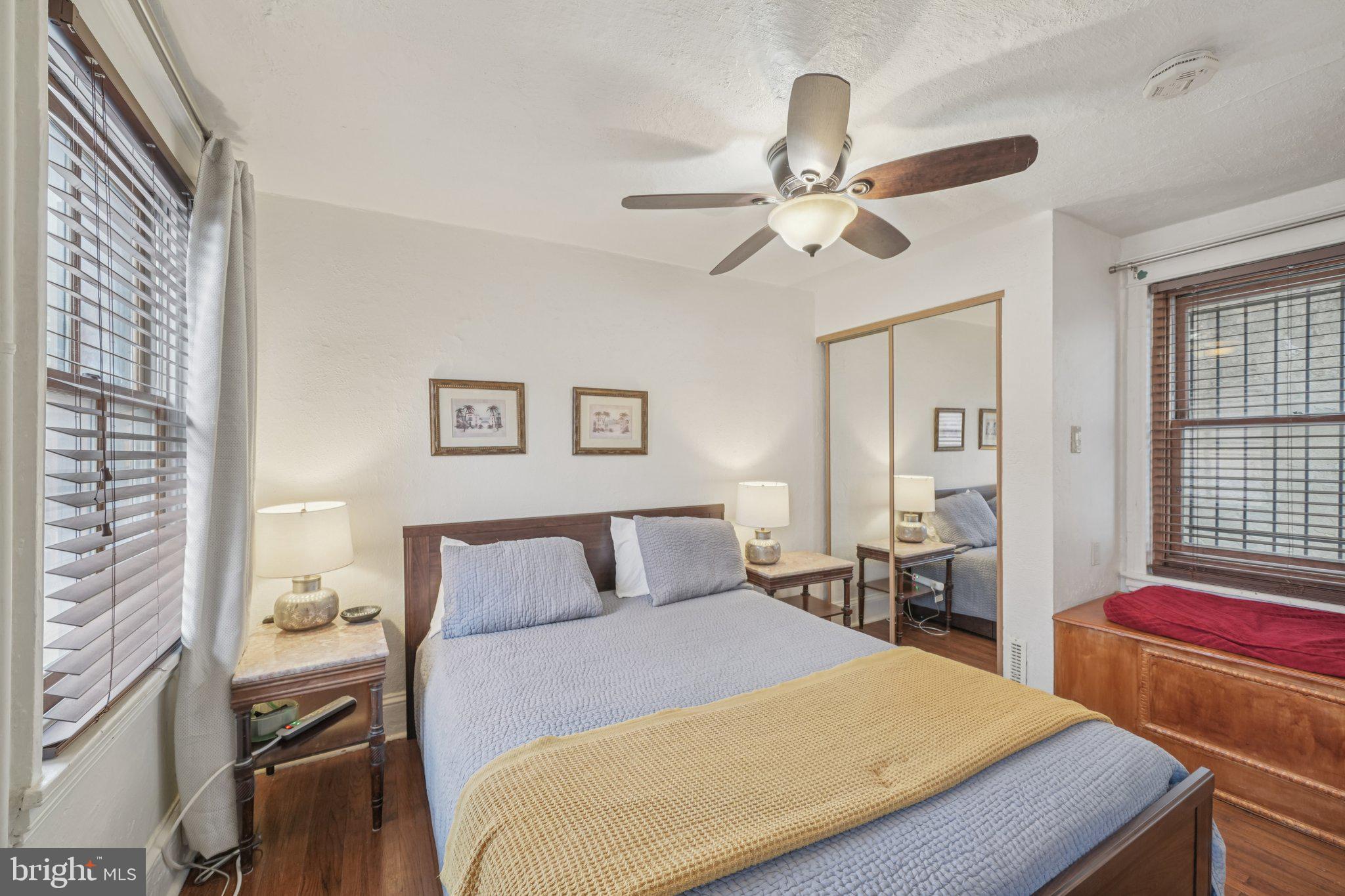 405 South 17th Street Philadelphia, PA 19146 - Photo 18 of 24 a bedroom with a bed and wooden floor