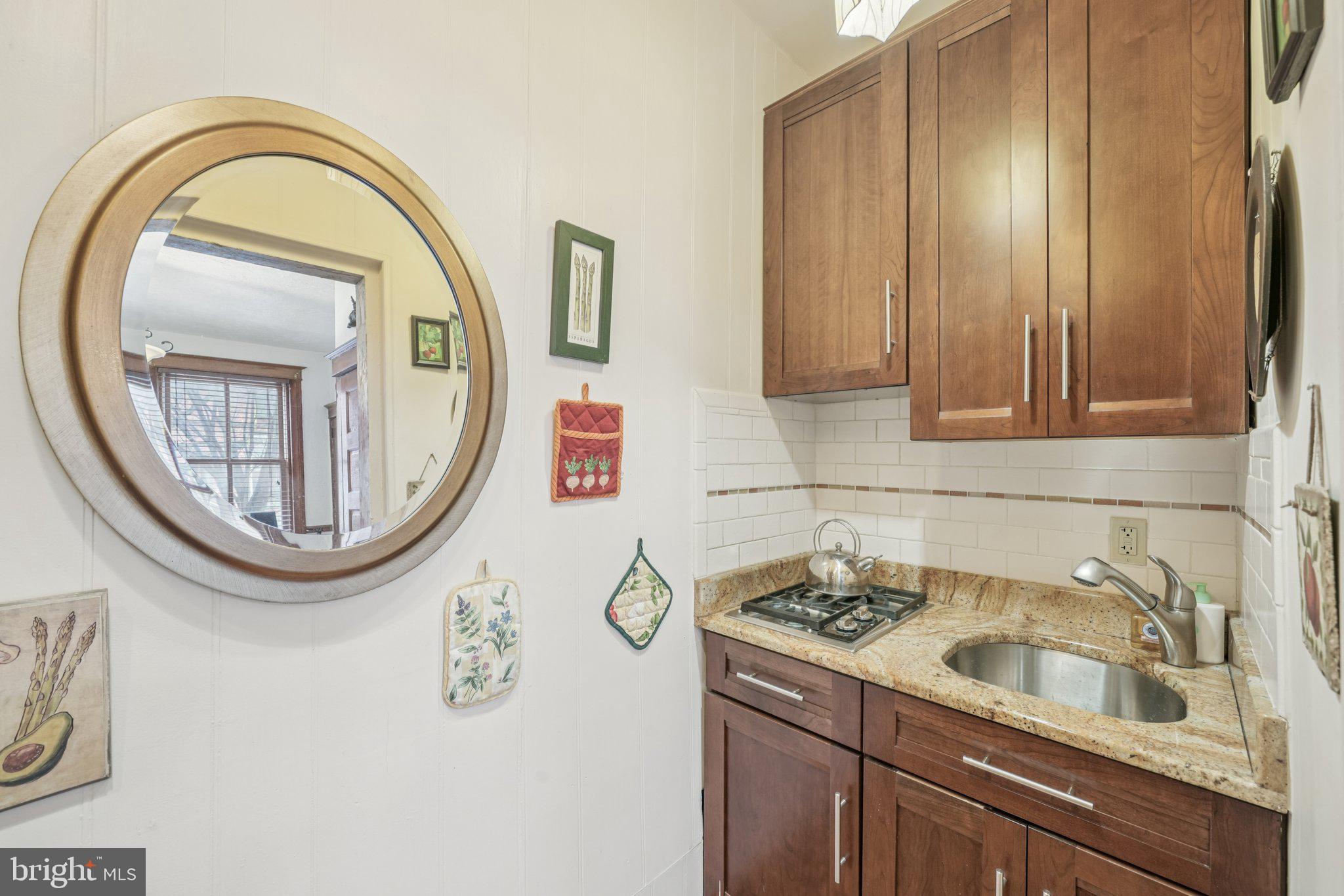 405 South 17th Street Philadelphia, PA 19146 - Photo 6 of 24 a bathroom with a sink and a mirror