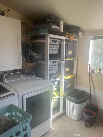 a kitchen with a stove and a sink