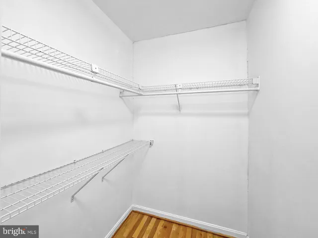 a view of a room with racks on the wall