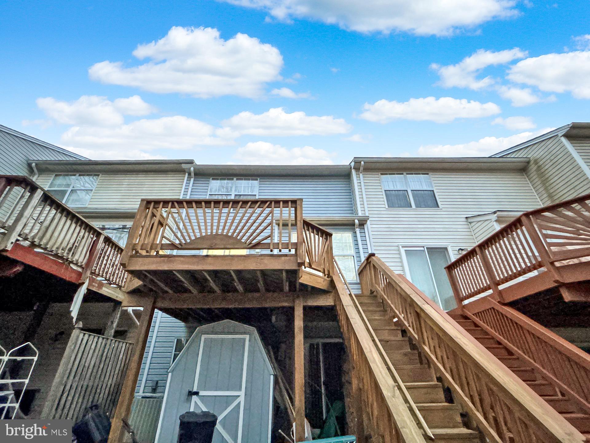 3558 Corn Stream Road Randallstown, MD 21133 - Photo 24 of 28 a view of a balcony with wooden floor