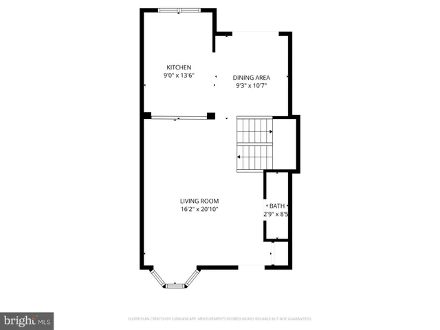 a picture of a bench in front of a wall