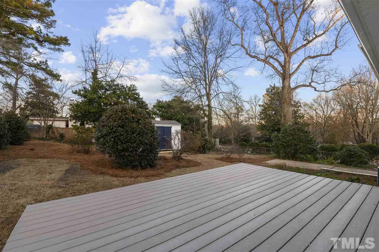 321 Compton Road Raleigh, NC 27609 - Photo 22 of 26 a view of a backyard of the house