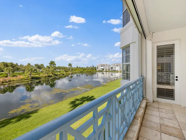 a view of swimming pool from a balcony