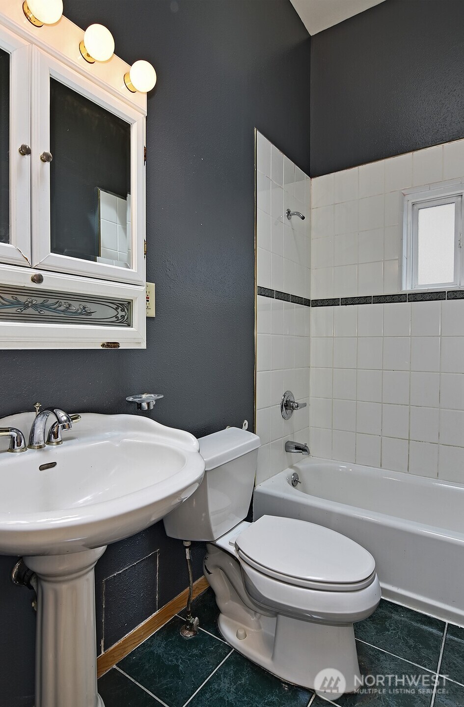 3015 Beacon Avenue South Seattle, WA 98144 - Photo 33 of 33 a bathroom with a sink a toilet and mirror