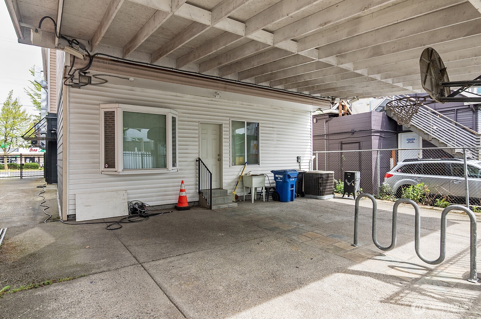3015 Beacon Avenue South Seattle, WA 98144 - Photo 6 of 33 a view of a patio with table and chairs under an umbrella