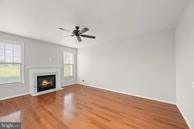 a kitchen that has a sink and a stove in it