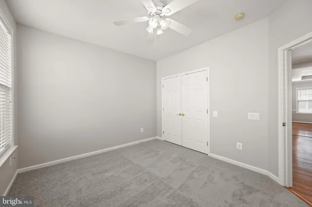 a view of a house with white walls