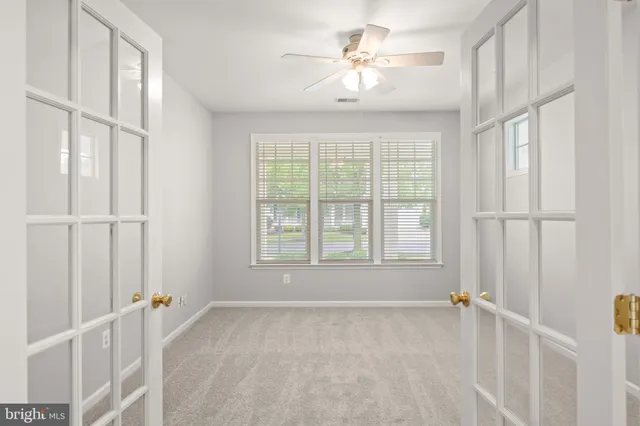 an aerial view of a house with a lake view