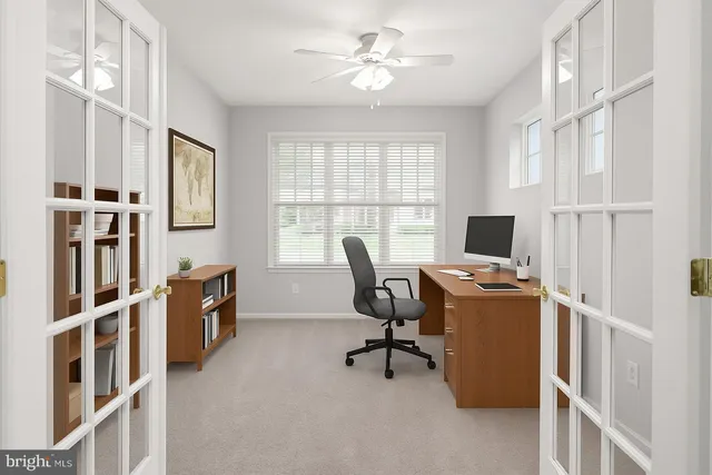 an aerial view of a house with a lake view