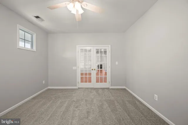 an aerial view of residential houses with outdoor space and city view