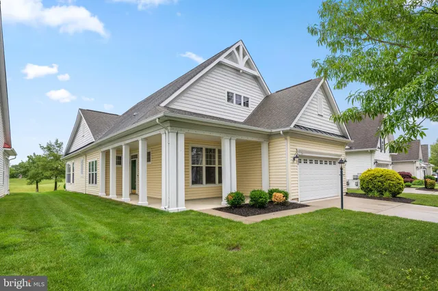 a view of a lake with a yard