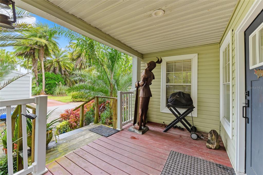 725 Cypress Road St. Augustine, FL 32086 - Photo 18 of 29 a view of a deck with wooden floor and outer view