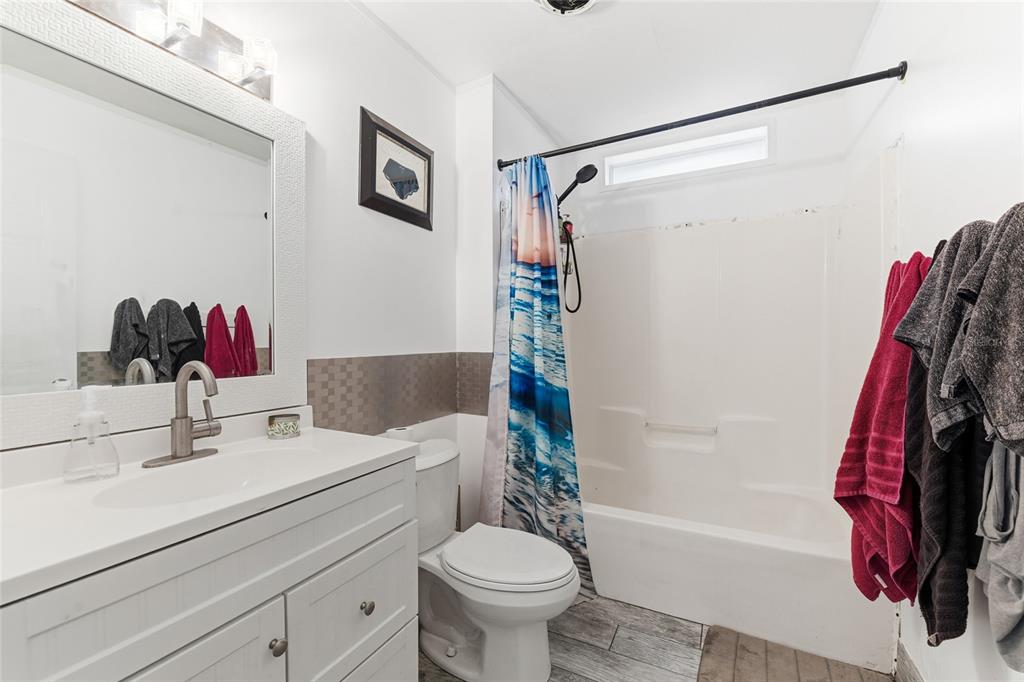 725 Cypress Road St. Augustine, FL 32086 - Photo 21 of 29 a bathroom with a sink toilet and shower