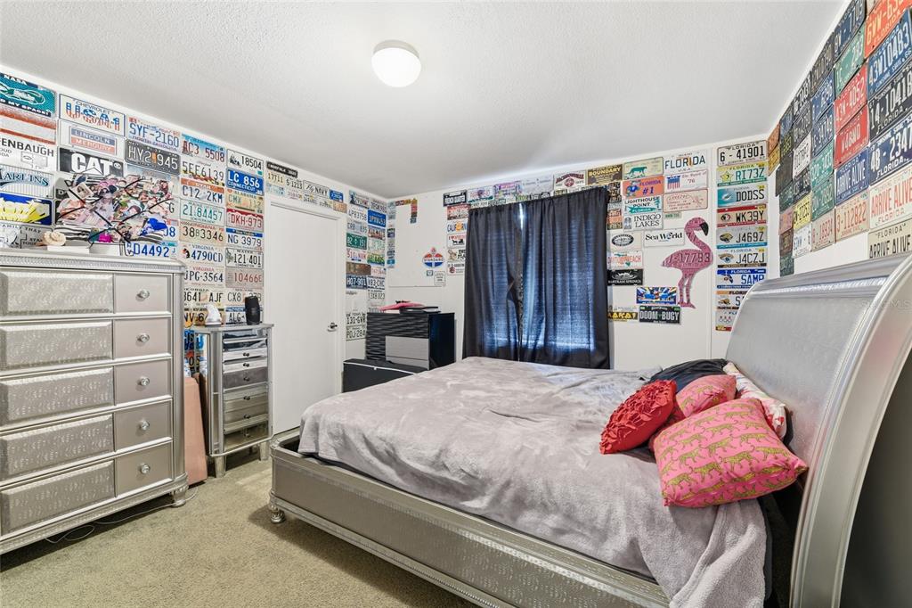 725 Cypress Road St. Augustine, FL 32086 - Photo 23 of 29 a bedroom with a bed and a window