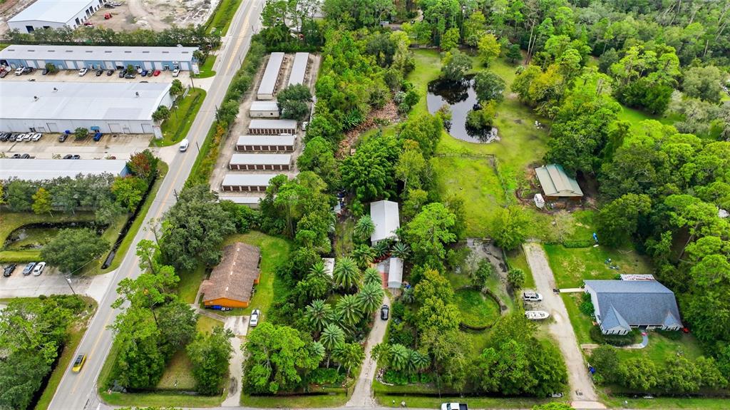 725 Cypress Road St. Augustine, FL 32086 - Photo 3 of 29 an aerial view of residential houses with outdoor space and trees