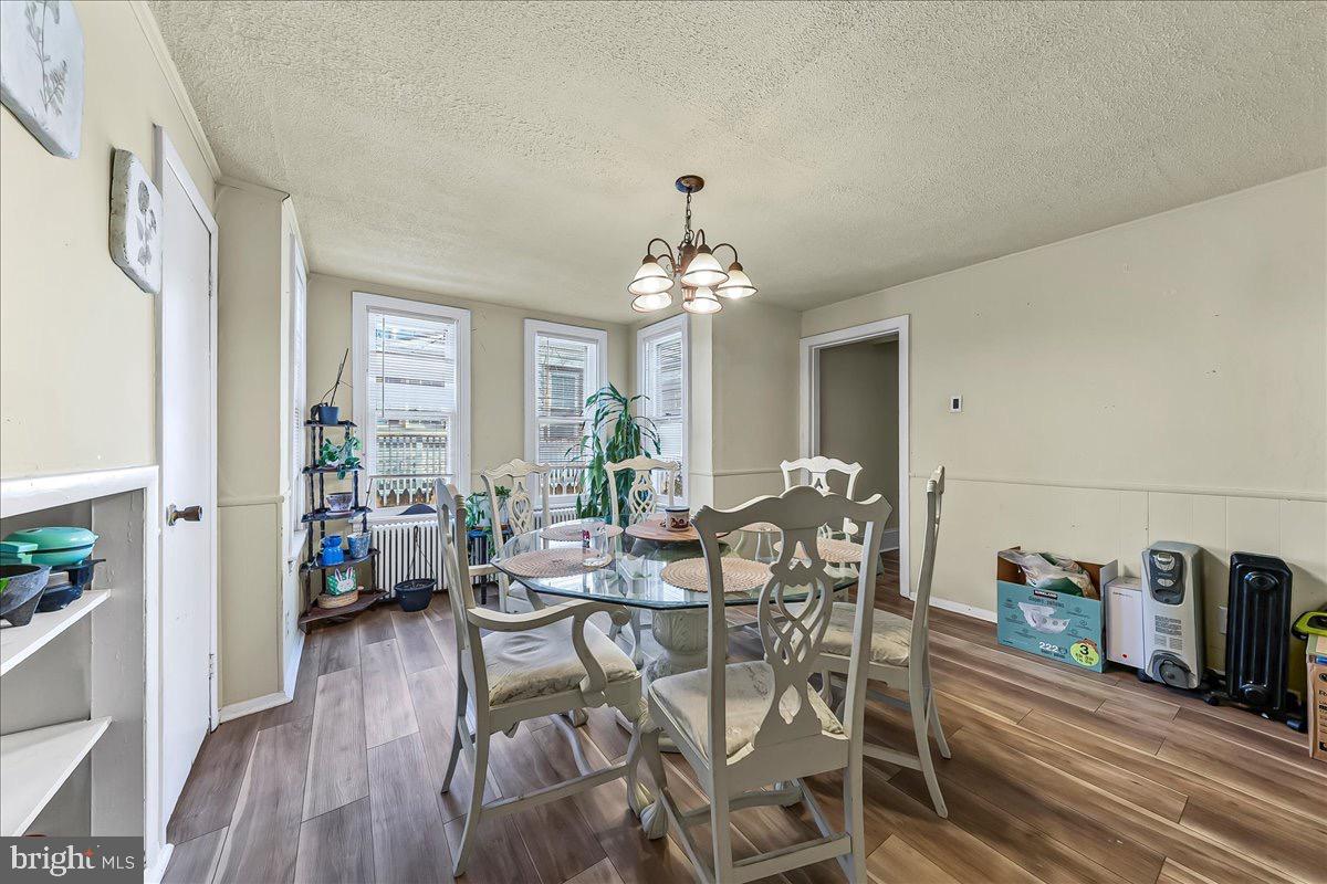 217 West Main Street Elkton, MD 21921 - Photo 14 of 37 a view of a dining room with furniture window and wooden floor