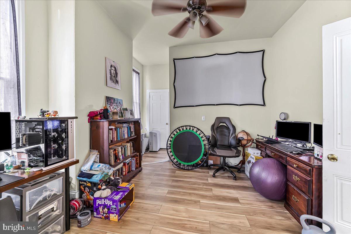 217 West Main Street Elkton, MD 21921 - Photo 17 of 37 a bedroom with furniture and a workspace