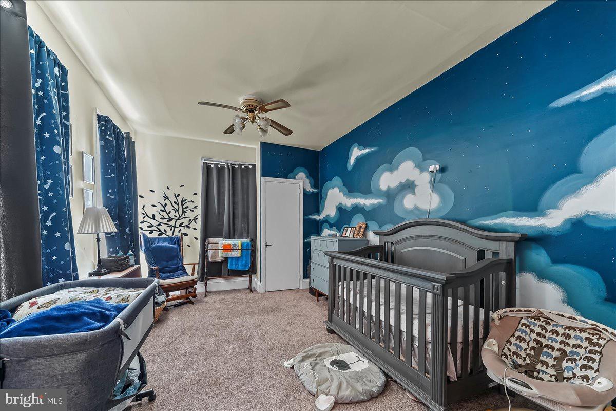 217 West Main Street Elkton, MD 21921 - Photo 24 of 37 a bedroom with furniture and a window