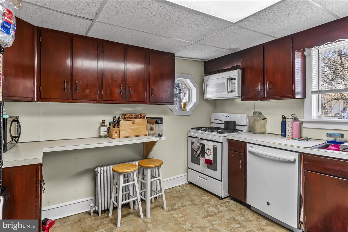 217 West Main Street Elkton, MD 21921 - Photo 9 of 37 a kitchen with a sink and cabinets