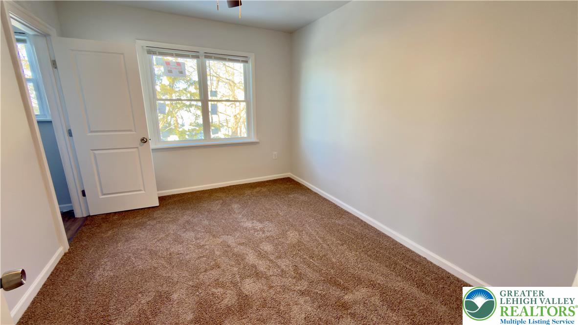 403 North Walnut Street, Unit B Bath, PA 18014 - Photo 20 of 31 an empty room with a window