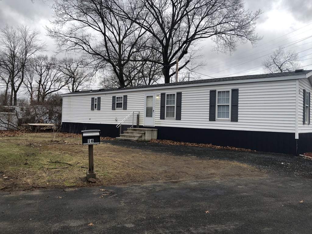 34 Pioneer Way Springfield, MA 01119 - Photo 1 of 1 a front view of a house with a yard