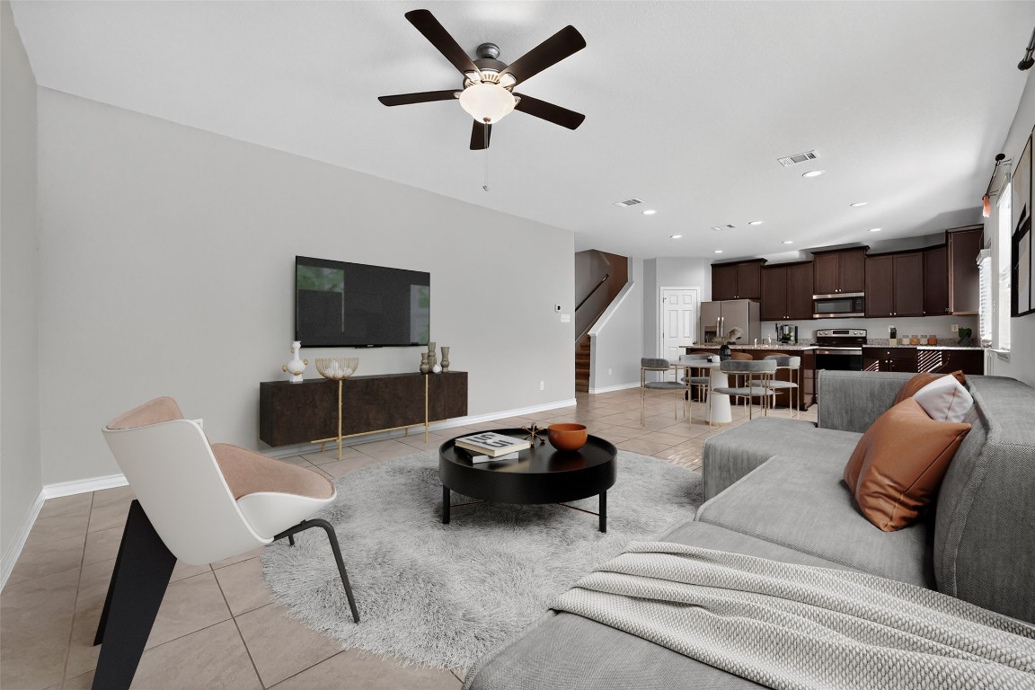 548 Appalachian Trail Leander, TX 78641 - Photo 2 of 38 a living room with furniture and a flat screen tv