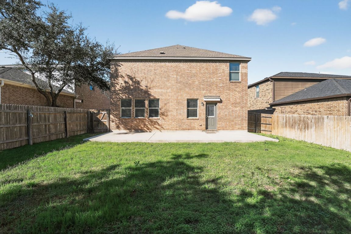 548 Appalachian Trail Leander, TX 78641 - Photo 35 of 38 a view of a house with backyard and a patio