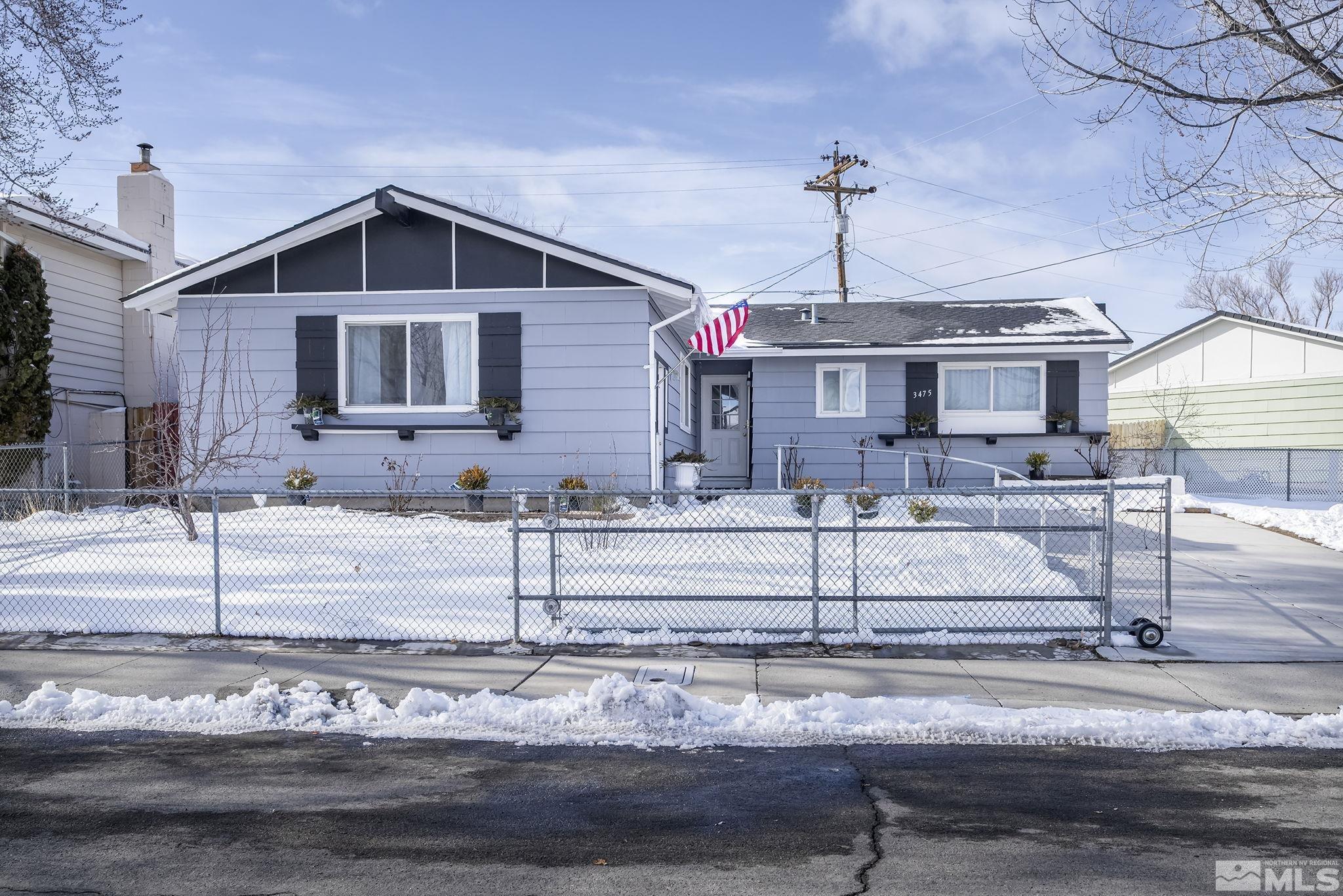 3475 Rauscher Drive Reno, NV 89503 - Photo 2 of 16 a front view of a house with a yard