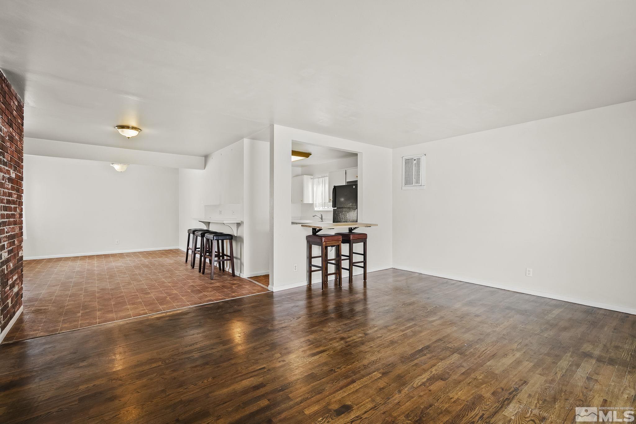 3475 Rauscher Drive Reno, NV 89503 - Photo 4 of 16 a view of a livingroom with furniture and wooden floor