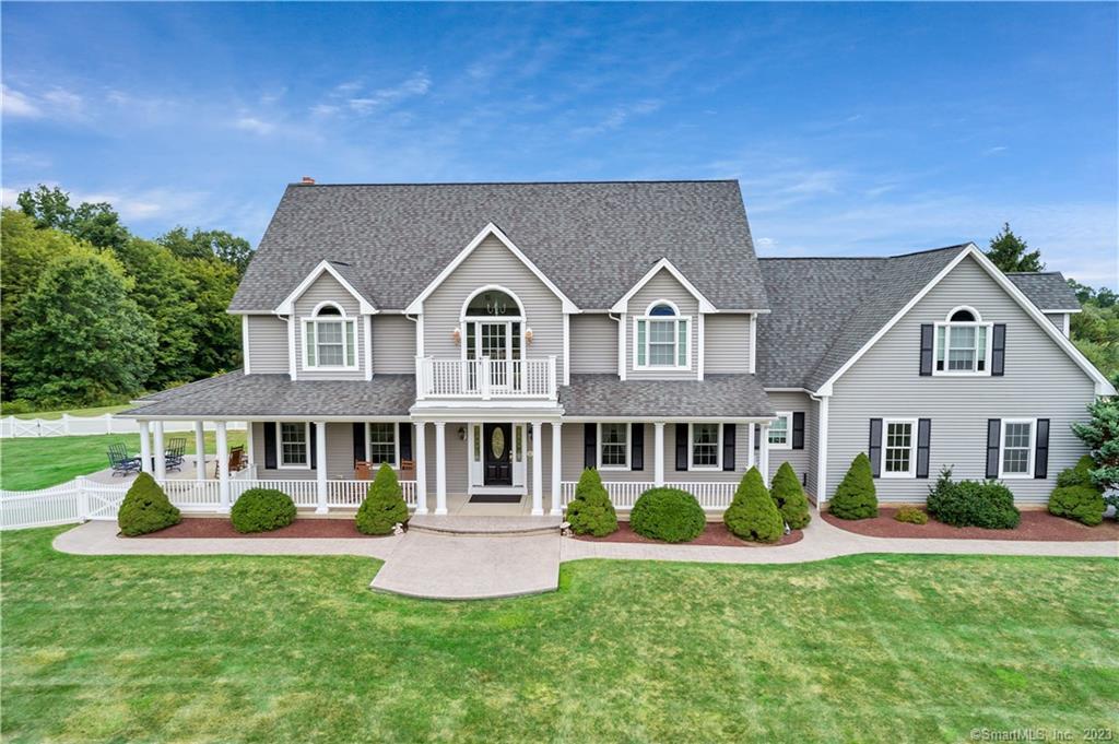 15 Cherry Ridge Road Middlefield, CT 06455 - Photo 1 of 1 a front view of a house with a yard