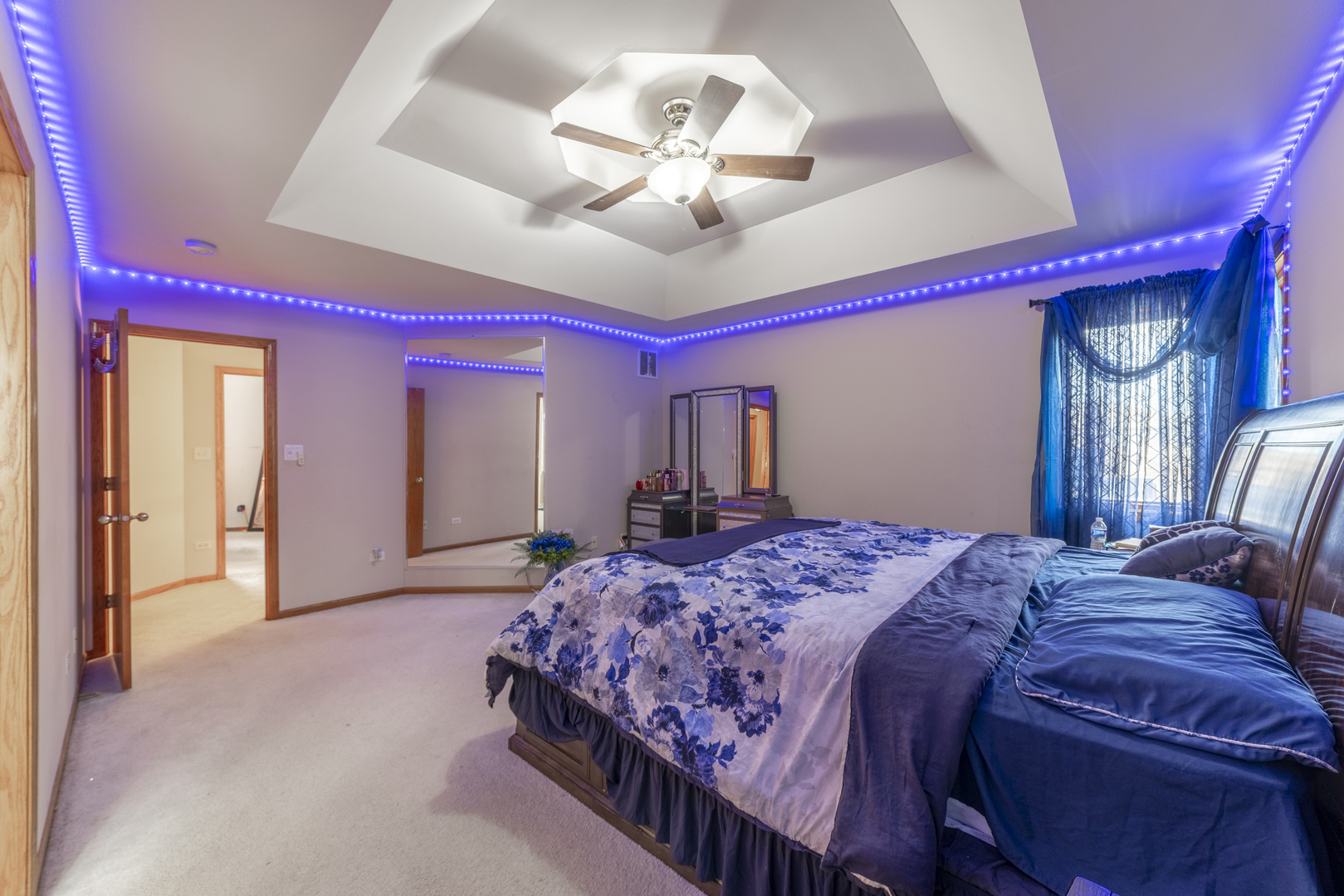 1071 Yamma Ridge New Lenox, IL 60451 - Photo 24 of 51 a bedroom with a bed and a chandelier