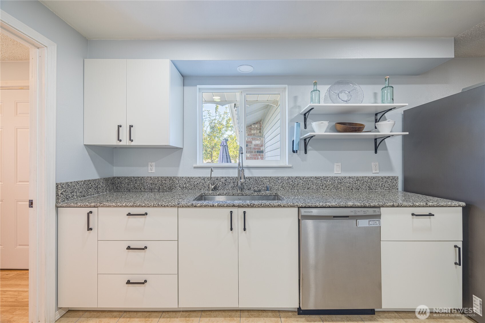 642 Kitchen-Dick Road Sequim, WA 98382 - Photo 14 of 40 a kitchen with granite countertop a sink and a stove