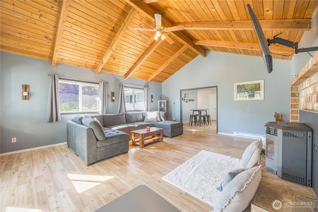 a living room with furniture and a table