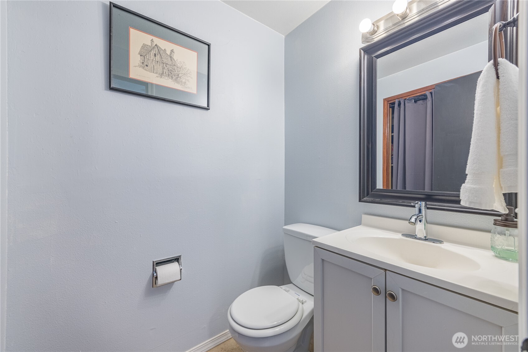 642 Kitchen-Dick Road Sequim, WA 98382 - Photo 26 of 40 a bathroom with a toilet a sink and mirror