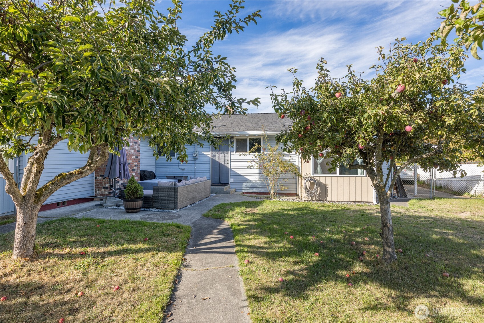 642 Kitchen-Dick Road Sequim, WA 98382 - Photo 30 of 40 a view of a house with backyard porch and sitting area