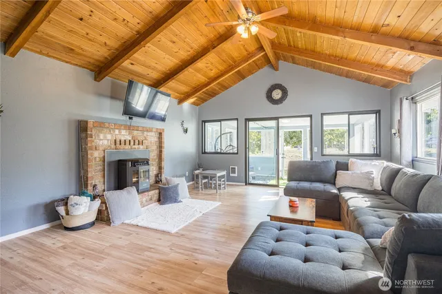 a outdoor space with patio furniture and a fireplace