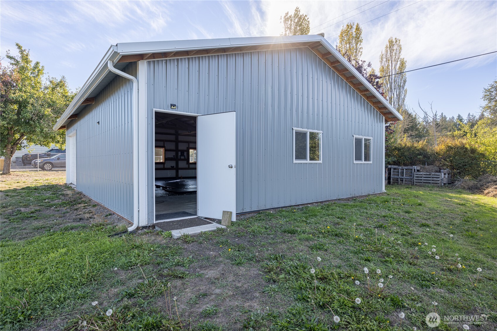 642 Kitchen-Dick Road Sequim, WA 98382 - Photo 33 of 40 a backyard of a house with lots of green space