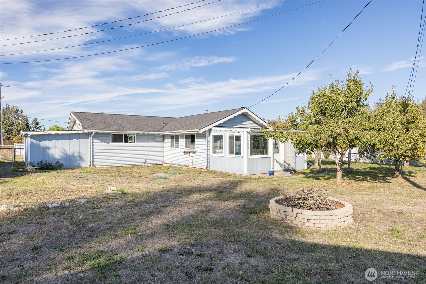 642 Kitchen-Dick Road Sequim, WA 98382 - Photo 38 of 40 a view of a house with backyard and trees